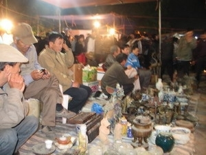 Buying luck at Vieng Market
